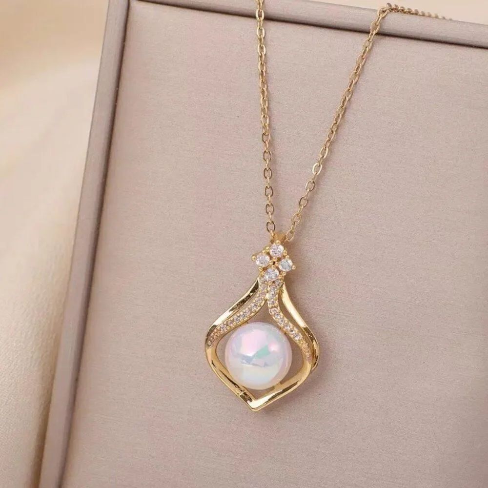 Pearl-in-Purse Necklace Golden Pendant Nestled by Cubic Zirconia on Lip Chain